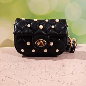 Black quilt faux pearl accent gold tone hardware mini crossbody adjustable strap